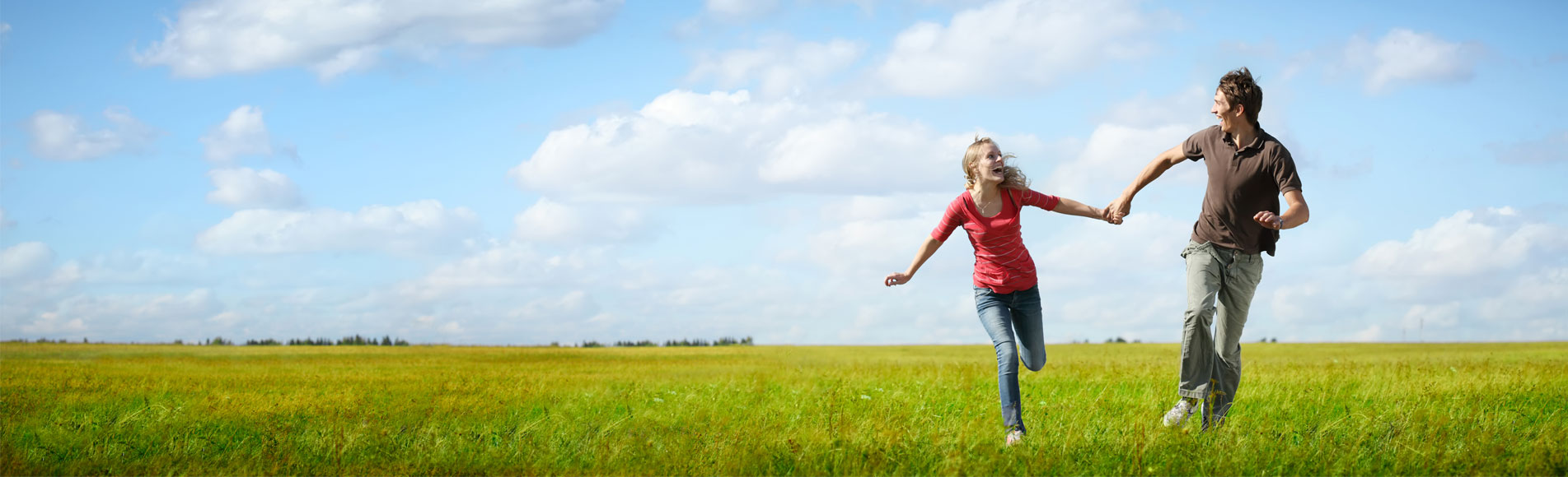 A woman running in a field.